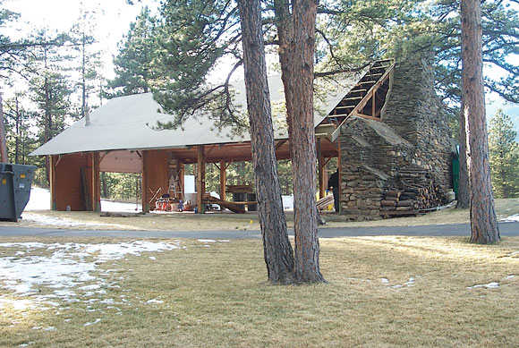 Deconstruction of the original Pavilion built in 1954. During the Smith era, a large overhead garage door was installed for helicopter access and storage. The original grand stone fireplace was preserved for the new Pavilion.